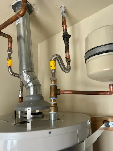 Water heater installation and plumbing repair in West Kingston